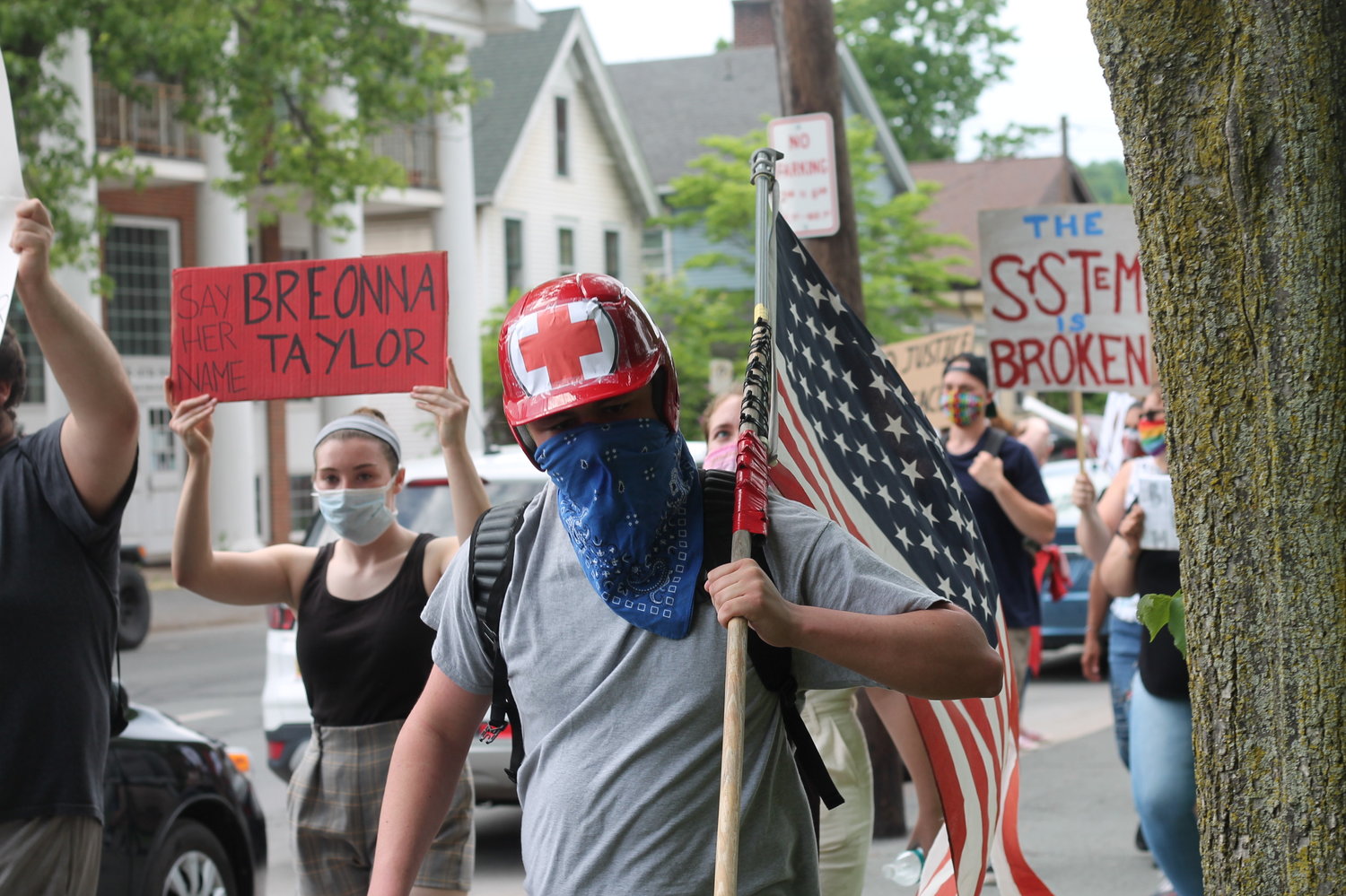 Protestors marched along the perimeter of Honesdale Central Park on June 4.